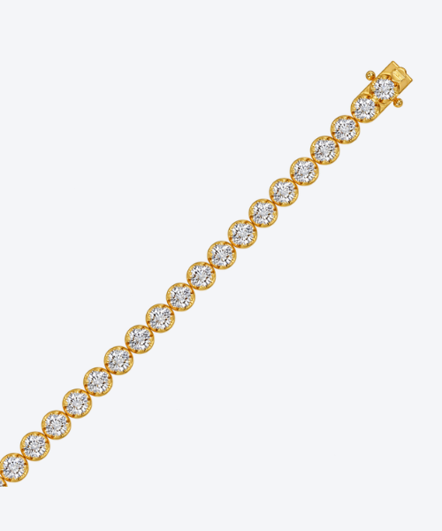 Microfusion prong diamond setting on 18K yellow gold tennis bracelet