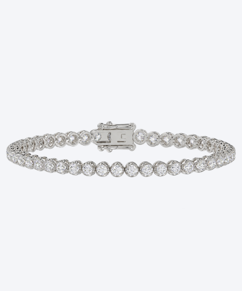Microfusion prong natural diamond tennis bracelet in 18K white gold